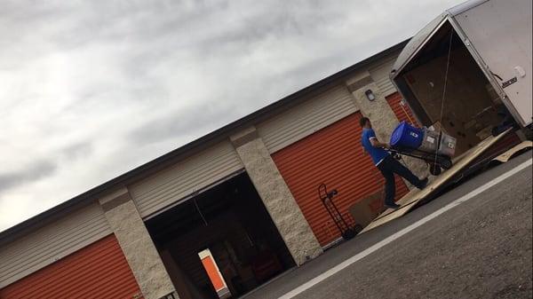 Jim unloading into a storage unit.