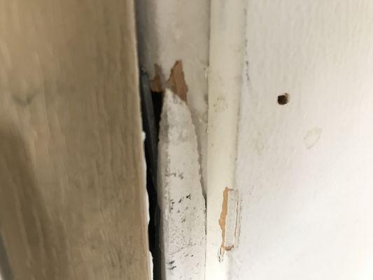 Door frame damaged by Silicon Valley Foundation.