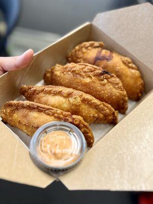 Beef Empanada box and our signature Aioli