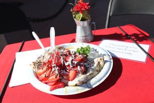 Strawberry, Banana & Nutella crepe on a wheat flour pancake.