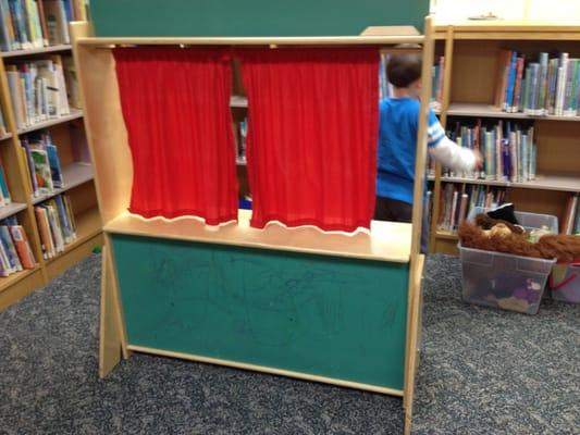 Small stage for kids to put on puppet show.