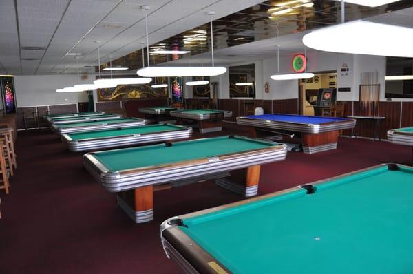 This is a view of the tables in the back room that has a jukebox