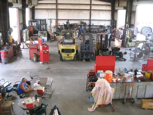 large modern shop facility with tooling and expertise to perform small repairs to total refubishing.