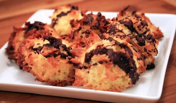 Classic coconut macaroon with finely grated orange zest and drizzled with chocolate.