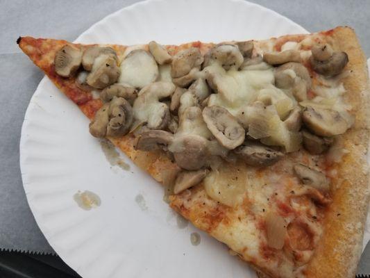 Whole wheat pizza with mushrooms.