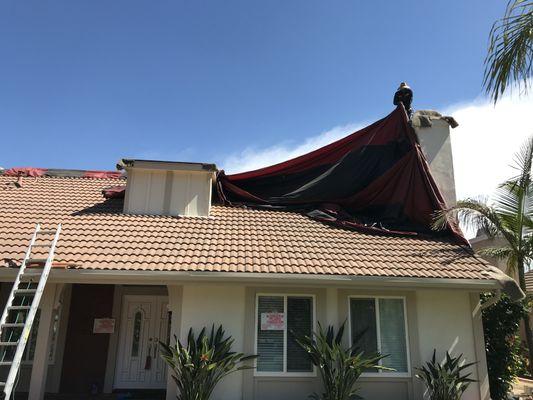 Termite Fumigation in Anaheim Hills. Property has two high chimneys.