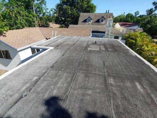 Walking all areas of a roof showing wear