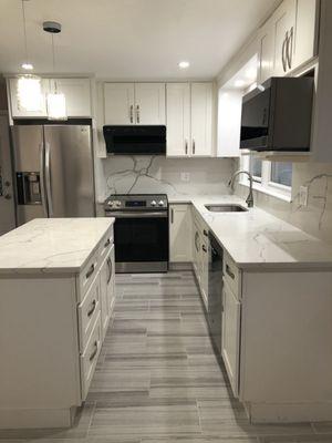 Everything minus the appliance, lights and faucet are from Star Cabinet Kitchen.