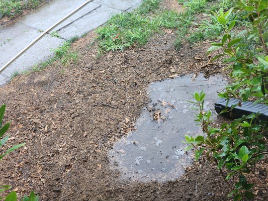 Great spot for down spout to drain.