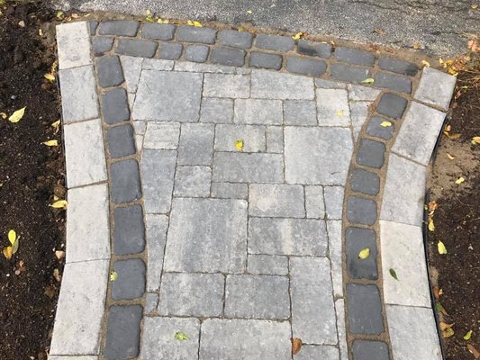 Techo Bloc pavers in Champlain Grey with accent borders Installed by Joshua's Landscape Design in Glen Gardner NJ