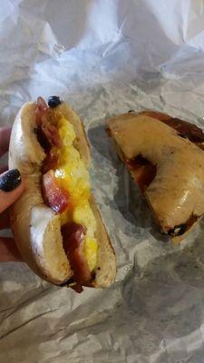 Blueberry bagel sandwich with eggs, bacon, and cheddar! My favorite combination. :)