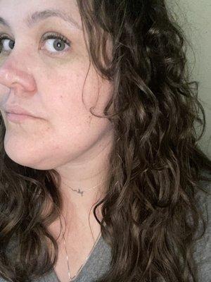 Same white femme but post-haircut (about a week later). Curl pattern is significantly more even and manageable.