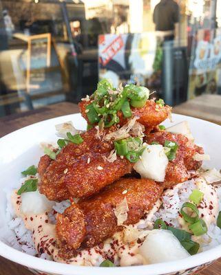 ORANGE-ISH CHICKEN BOWL : Korean fried chicken with sweet & spicy glaze over seasoned rice w/ kimchi aioli, pickled daikon, & bonito flakes