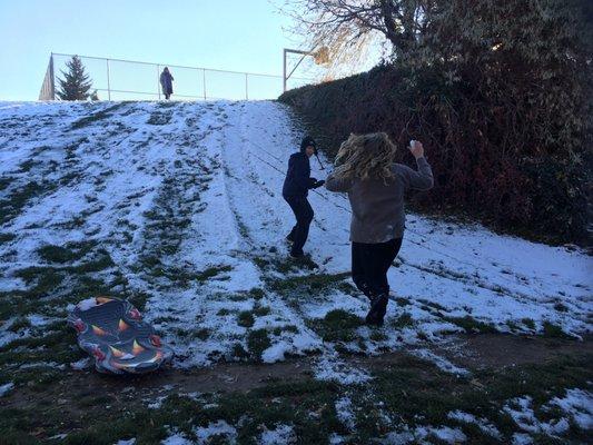 Perfect small sledding hill for beginners. (Watch out for te tree because you pick up pretty good speed)