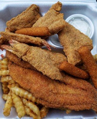 6 piece shrimp + 1 spicy catfish fillet  and 3 hush puppies