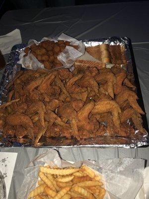 Fried chicken wing platter, okra, fries