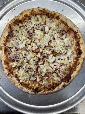 The 'OHANA- choose bbq or pizza sauce with ham, pineapple and red onion