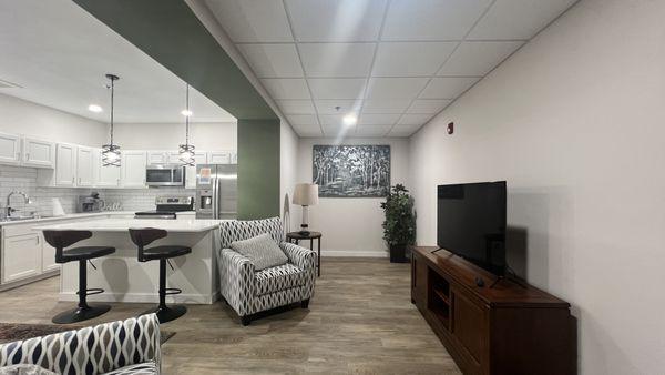 Living room of one of our furnished apartments at Cinema Apartments.