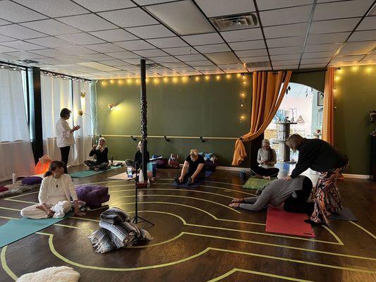 The yoga studio has a labyrinth on the floor!