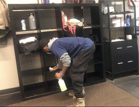 -Cleaner in action cleaning cubby station
-Routine clean at a gym