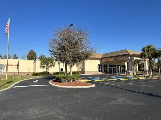 Clean parking lot with plenty of spaces and a covered drop off lane at the entrance. Very convenient!