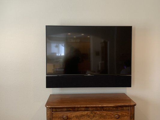 Mounted TV and Soundbar