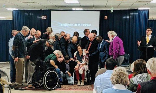 Prayer over Brian and Becky LoPiccolo.