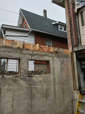 This Foundation contractor did not follow architect's drawings, resulting in addition not lining up with the home.