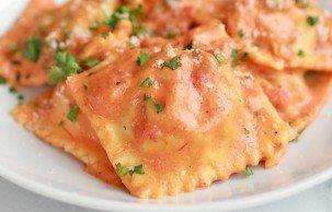 Wild mushroom ravioli with sun dried tomato cream sauce