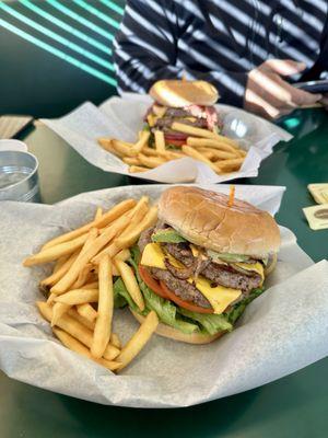 Double avocado cheese burger with grilled onions.