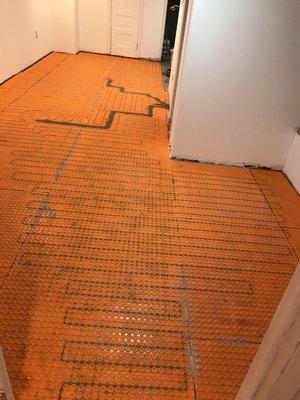 Heated floor for basement