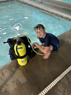 Scuba explorers. Teaching the young to scuba dive.