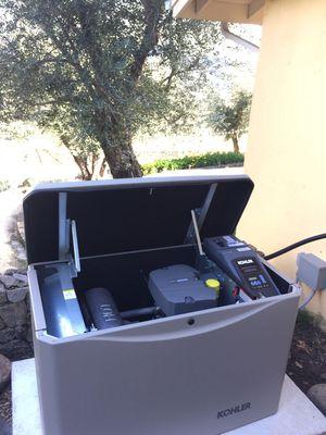 Backup generator with automatic transfer installed with solar at winery.