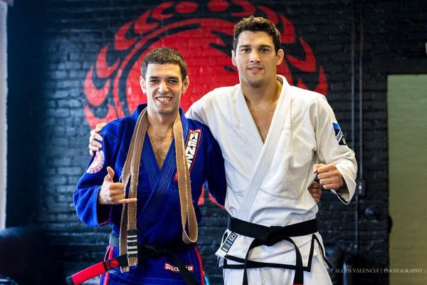 Professor Marroquino receiving his black belt from Professor Robson Gracie under Master Renzo Gracie