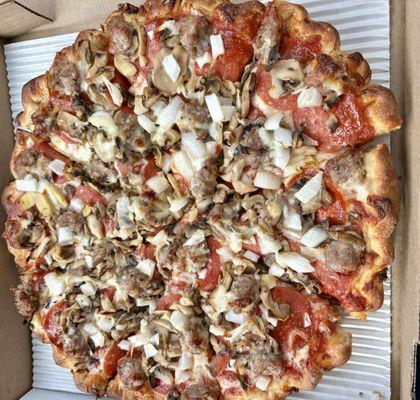 Large pepperoni, sausage, mushroom & onion. $20.00 and well worth it!  That pinched crust is really the "icing on the cake".