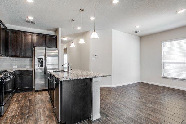 Dining Room and Kitchen Before Staging