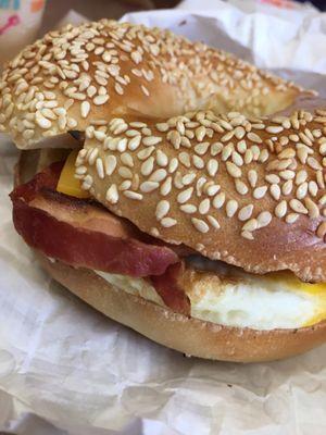 Sesame toasted bagel w egg, bacon & cheese.