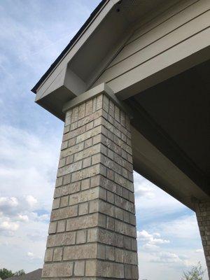 Trim around top of brick column