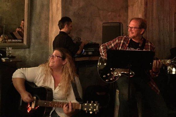 Steph and Greg performing at the student showcase in a live venue!