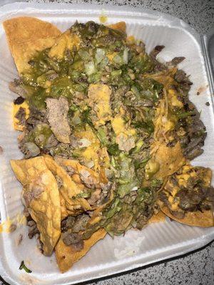 Carne asada nachos. Meat clearly under cooked! And they wouldn't let me change my dish said we don't do that. Too bad you didn't like it.