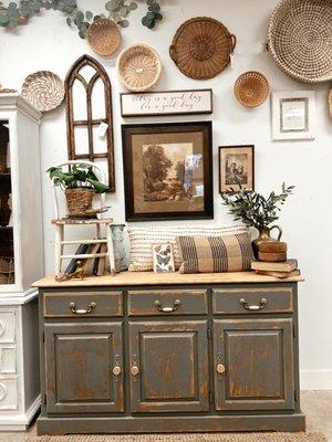 Refinished small green buffet with heavy distressing.