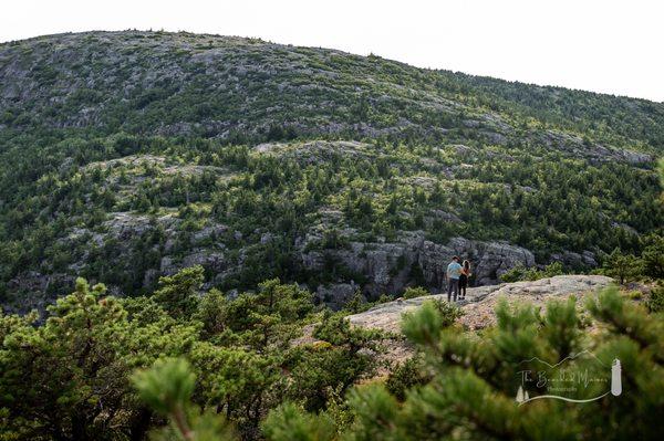 Engagement on Dorr Mountain overlooking Cadillac Mountain in Acadia National Park