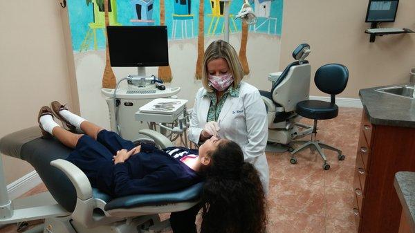 Dr. Mazzei examining a patient