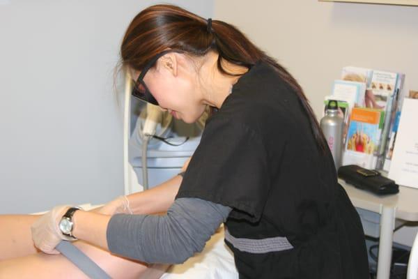 Sharon Canet, RN, performs laser hair removal.