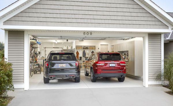 Can you fit both vehicles in your garage?  With our sleek garage designs you'll have room for everything...even the cars!