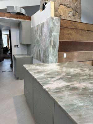 Alexandrita Quartzite backsplash & countertops by Leonardo's Marble & Granite