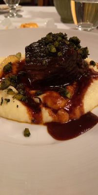 The prime rib entree, topped with pistachios and over a nice mashed potatoes which were full of taste, fully recommend.