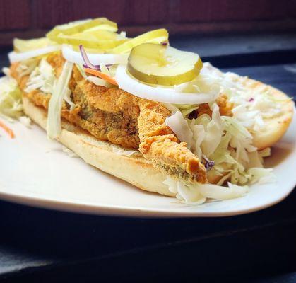 Whiting Po'Boy (Crispy seasoned whiting, french roll, cabbage, white onions, pickles and house tartar sauce)