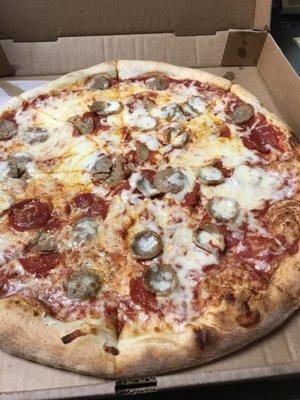 Pepperoni and sausage. Sausage was round like pepperonis.