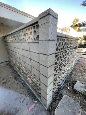 A combination of breeze block with 4" block and 8" columns